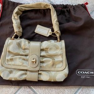 Beautiful beige Coach purse